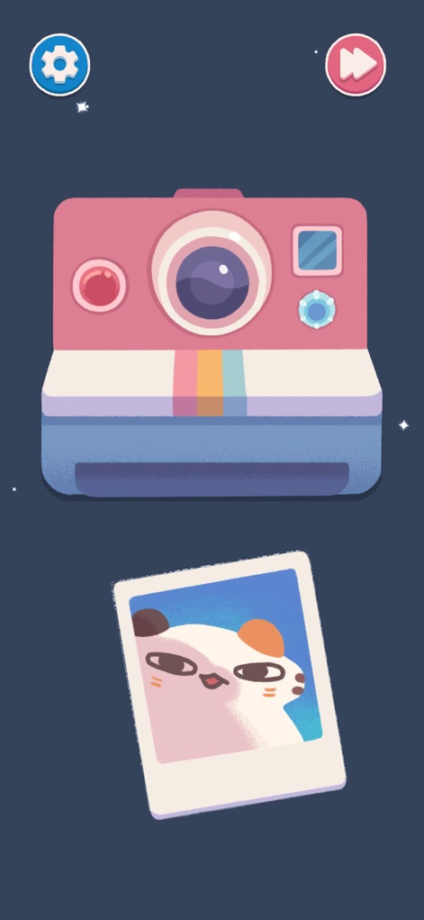 Satisday ASMR: Cozygame - Witness the delightful interaction of a vibrant pink instant camera creating a charming polaroid photo of a cute animal, adding a touch of playful creativity.
