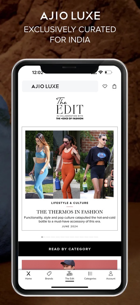 AJIO Online Shopping App - The 'AJIO LUXE' experience extends to 'THE EDIT' content section, providing users with fashion-forward articles and curated style insights, like 'THE THERMOS IN FASHION'.