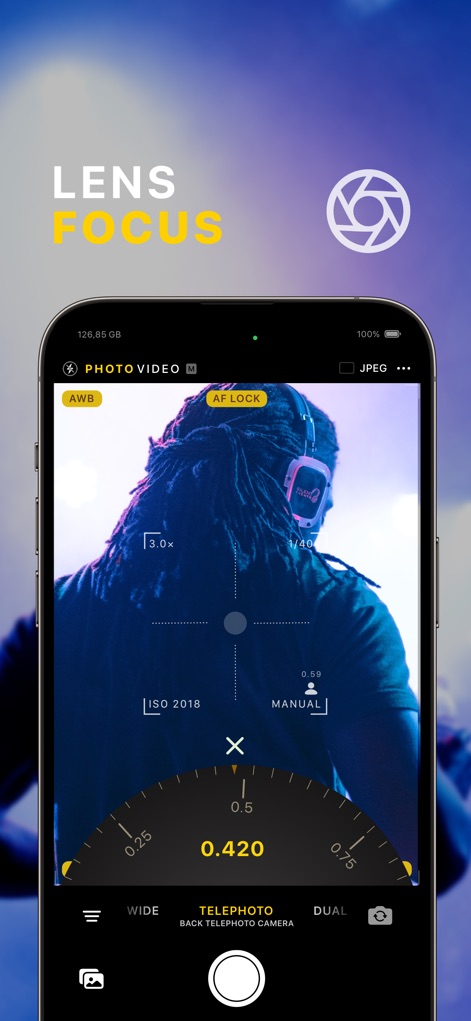 xZoom Cam - PRO Camera - This interface reveals the app's precise "LENS FOCUS" feature, allowing users to manually adjust the focal point with a detailed "0.420" dial, ensuring critical sharpness on their subjects.