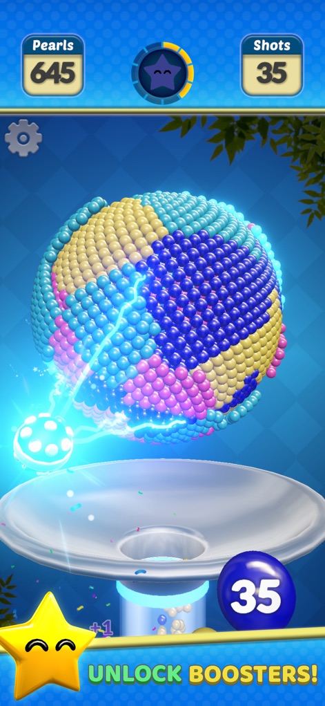 Pearl Gem! - Aquí se observa el impacto visual de un potenciador activo transformando la vibrante esfera multicolor, lo que sugiere una mejora en la estrategia de juego.