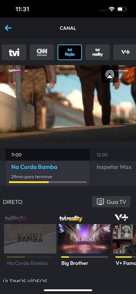 TVI Player - Users can effortlessly switch between various live channels using the top navigation tabs, while simultaneously viewing current program details and accessing the 'Guia TV' button.