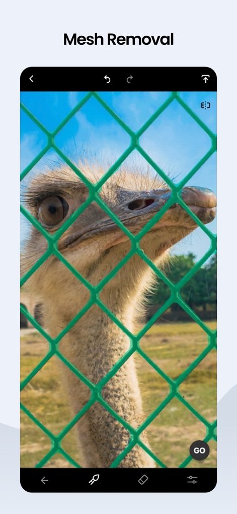 TouchRetouch - The app expertly detects and removes challenging mesh obstructions, revealing clear subjects like animals behind fences with a single "GO" button interaction.