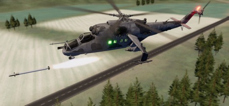 C-RAM CIWS simulator - Un helicóptero Mi-24 Hind ejecuta un ataque aéreo, lanzando un misil con un rastro de humo visible sobre un paisaje que combina zonas boscosas y una carretera.