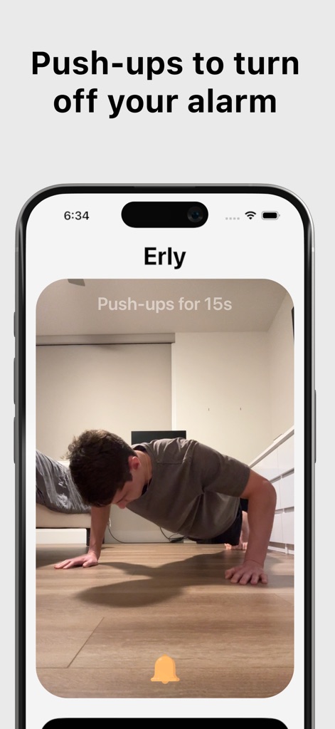 Erly: Wake Up Early - This view demonstrates an active alarm dismissal requiring physical engagement, showing the 'Push-ups for 15s' prompt and a clear bell icon indicating the alarm is active.