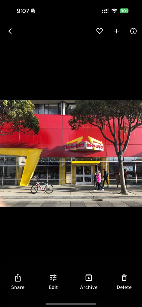 Immich - Immich allows for detailed viewing of individual photos, complete with quick actions like "Share" and advanced "Edit" options.