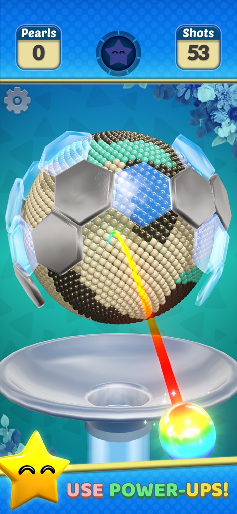 Pearl Gem! - Los usuarios pueden apreciar cómo la aplicación integra obstáculos hexagonales que varían la estrategia, combinados con el rastro de luz de un disparo potenciado para superar desafíos.