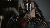 Video artwork for Trouble by Skindred