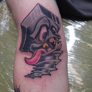 One Up Tattoo