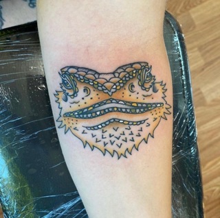 Hen’s Tooth Tattoo photo 10