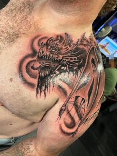 Asylum Tattoo Co