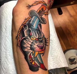 Solid Gold Tattoo photo 10