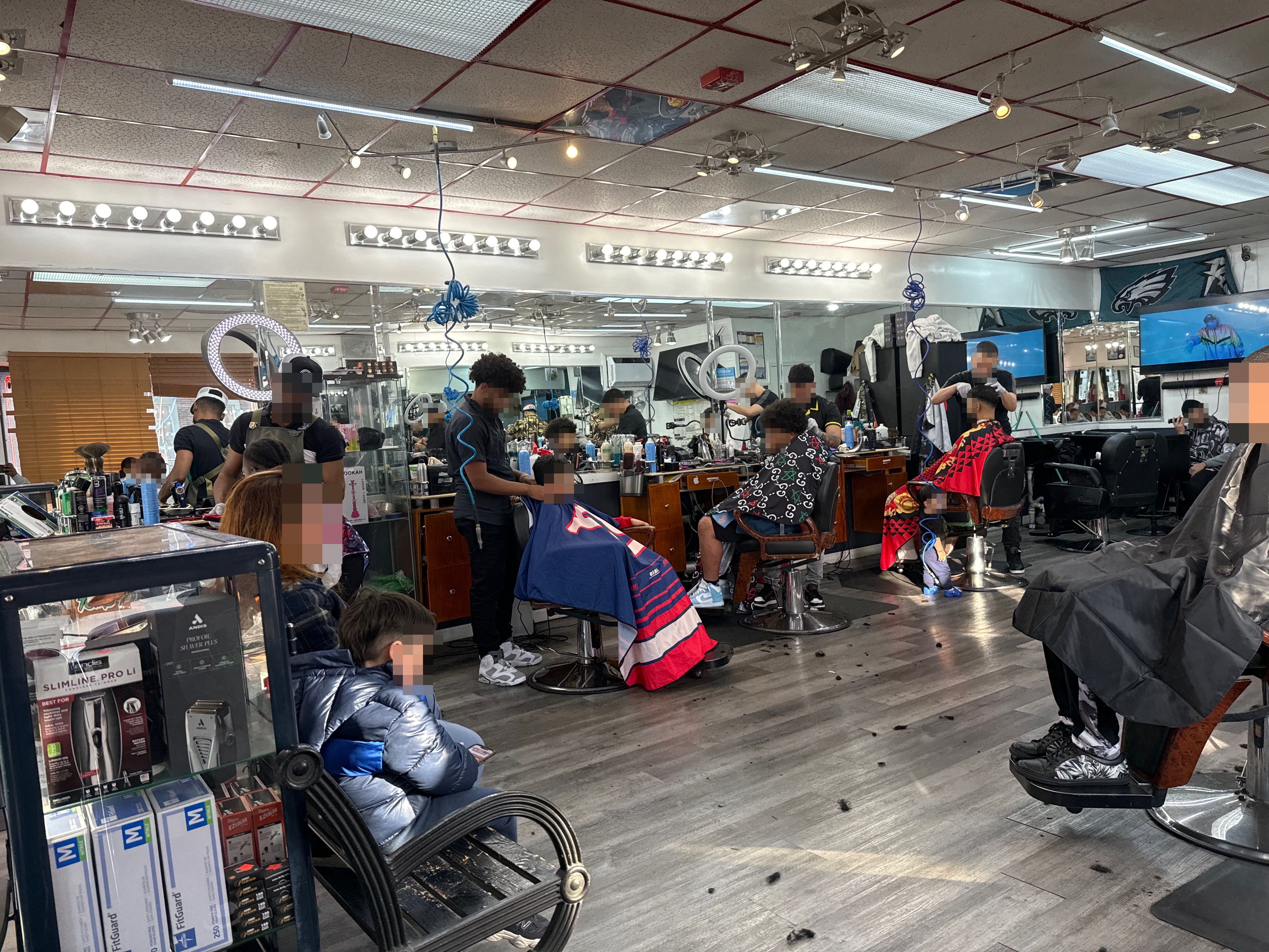 Aguila Barbershop inc