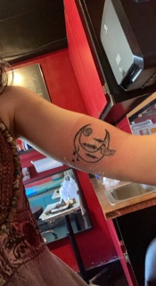 Doc Bones' Aim True Tattoo photo 6