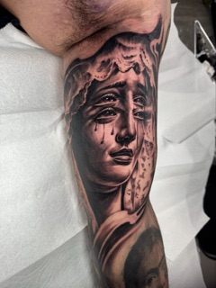 Birds of Sin Tattoo Parlor