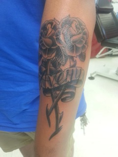 Rusty’s Needles Tattoo