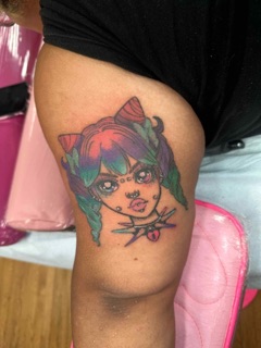 Wisteria Piercing and Tattoo